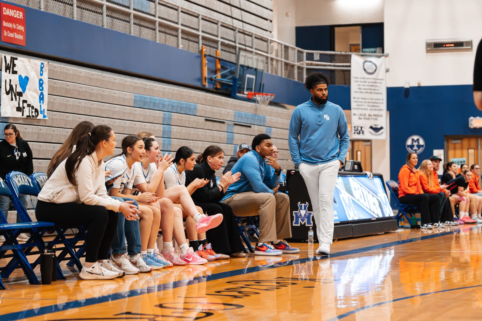 Coach Zay working the sideline at McNary High School